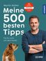Text: "Martin Rütter - Meine 500 besten Tipps. Facts rund um den Hund." Ein Mann mit einem Hund, der nach oben schaut., Buch