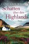 „Schatten über den Highlands“ von Constanze Wilken. Ein weißes Haus, grüne Hügel und zwei Pferde im Vordergrund.
