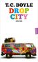 T.C. Boyle, Drop City, Roman; ein bunt bemalter Van mit „Love“ und „Peace“ Symbolen, Hanser Verlag., Buch