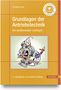 „Grundlagen der Antriebstechnik.“ Illustration mit drei Comic-Figuren, die an einer Maschine arbeiten., Buch