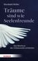 Buch: "Träume sind wie Seelenfreunde" von Wunibald Müller. Weiße Taubenflügel auf dunklem Hintergrund., Buch