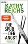 KATHY REICHS, Thriller, DIE SPUR DER ANGST. Skalpell und Pinzette mit Waldreflektion im Hintergrund., Buch