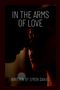 Text: "IN THE ARMS OF LOVE" und "WRITTEN BY SIMON DANIEL". Silhouette von zwei nahen Gesichtern., Buch