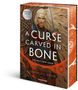 Danielle L. Jensen: A Curse Carved in Bone - Die Skaland-Saga, Band 2 (Epische Romantasy | Limitierte Auflage mit Farbschnitt), Buch