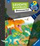 Susanne Gernhäuser: Wieso? Weshalb? Warum? Leuchte und entdecke: Dinosaurier (Taschenlampen-Buch mit Folien und Klappen), Buch