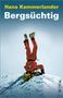 Oben steht "Hans Kammerlander", darunter "Bergsüchtig". Ein Kletterer im roten Anzug macht einen Handstand im Schnee., Buch