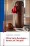 Text: Ohne harte Bandagen – Boxen als Therapie. Autoren: Angermann, Grünwald. Ein Boxsack mit roten Handschuhen., Buch