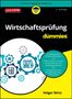 „Wirtschaftsprüfung für dummies“, blaue Zahnräder mit Wirtschaftssymbolen, Textfeld mit Beschreibung der Prüferaufgaben.