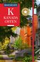 „KANADA OSTEN“ in weiß auf rotem Hintergrund, blühende Straßenansicht mit Backstein- und weißen Häusern, Bäume im Herbst., Buch