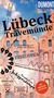 Titel: "Lübeck Travemünde". Schlagworte: "Verballhornen?", "Perfektionisten", "Schippertempo". Hintergrund: Backsteinfassade., Buch