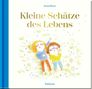 „Kleine Schätze des Lebens“ steht in der Mitte. Zwei Kinder liegen lächelnd auf einer blumigen Wiese., Buch