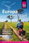 "Europa per Rad" von Herbert Lindenberg. Ein Radfahrer in einer grünen Landschaft auf einem Feldweg., Buch