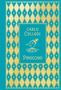 Text: "Carlo Collodi, Pinocchio". Ein stilisiertes Profil von Pinocchio, mit geometrischem, rautenförmigem Muster in gold und türkis., Buch