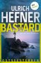 ULRICH HEFNER DER BASTARD KRIMINALROMAN OSTSEESTERBEN dot:books. Ein Leuchtturm auf Felsen an der Küste, bei Dämmerung., Buch