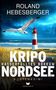 "ROLAND HEBESBERGER. KRIPO NORDSEE. HASSERFÜLLTES BORKUM. KÜSTENKRIMI. Eine Möwe fliegt über einen Leuchtturm am Meer.", Buch