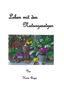 Der Text "Leben mit den Naturgesetzen" oben, "Von Karin Riepe" unten. Ein Arrangement aus Pflanzen und einer verzierten Säule., Buch