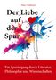 "Der Liebe auf der Spur" von Peter Niebisch. Zwei Figuren halten ein Herz, bunte Farbkleckse im Hintergrund., Buch
