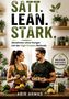 "SATT. LEAN. STARK." Zwei sportliche Personen halten Salatschüsseln, umgeben von frischem Gemüse in einer Küche., Buch