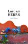 Text: "Lust am HERRN. Héloïze M Palmer".  
Oben viel Weißraum, unten rote Ziegelwand und blaue Blumen., Buch