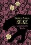 „Rainer Maria Rilke Gesammelte Werke” und die Silhouette eines Panthers vor floralem Hintergrund., Buch
