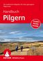 Handbuch Pilgern. Der praktische Ratgeber. PLANEN PACKEN PILGERN. Zwei Wanderer auf einem Weg in der Natur., Buch