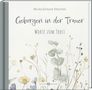 „Geborgen in der Trauer. Worte zum Trost“ von Nicola Schnack-Dörscher. Darunter zarte Blumenillustrationen., Buch