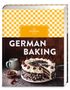 „GERMAN BAKING“ steht auf einem Buchcover mit Karo-Muster. Eine Schwarzwälder Kirschtorte und Kirschen sind abgebildet., Buch
