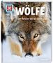"WAS IST WAS, Band 104, Wölfe, Im Revier der grauen Jäger." Ein Wolf blickt frontal in einer verschneiten Landschaft., Buch