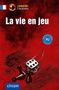 "La vie en jeu" steht groß auf rotem Hintergrund. Unten fliegt ein Würfel, zwei Kegel auf einer Spielfläche., Buch