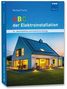 "ABC der Elektroinstallation, 16. überarbeitete Auflage" steht auf einem Buchcover mit einem modernen Haus bei Dämmerung.