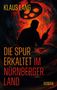 Text: "Klaus Lang. Die Spur erkaltet im Nürnberger Land. Roman." Darstellung: Silhouette einer Person mit Waffe, rot-schwarzer Hintergrund., Buch