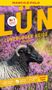 „LÜN Lüneburger Heide“, „Nr. 1 meistgekaufter Reiseführer“. Ein schwarzes Schaf auf lila Heideblumenfeld., Buch