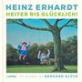 "Heinz Erhardt: Heiter bis Glücklich! Zwei fröhliche Figuren schaukeln an einem Baum in einer malerischen Landschaft."