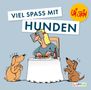 „VIEL SPASS MIT HUNDEN“. Eine Illustration zeigt eine Person mit Scheuklappen am Tisch, beobachtet von zwei Hunden., Buch