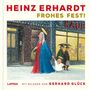 "Heinz Erhardt Frohes Fest!" steht oben. Eine humorvolle Illustration zeigt eine Frau und ein Kind im Schnee vor Geschäften., Buch