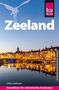 "Zeeland", "Ulrike Grafberger", "Reiseführer für individuelles Entdecken". Eine ruhige Hafenansicht bei Dämmerung., Buch