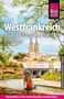 Westfrankreich Reiseführer. Frau sitzt mit Hut an einem Fluss, dahinter historische Gebäude und eine Kathedrale., Buch