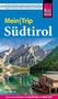 Titel "Mein Trip Südtirol". Untertitel zu Wandern und Genießen. Darunter ein See mit Bergen im Hintergrund., Buch