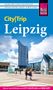 City|Trip Leipzig von David Blum. Moderner Platz mit hohem Gebäude und Menschen, blauer Himmel mit Wolken., Buch