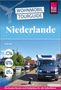 "WOHNMOBIL TOURGUIDE Niederlande. Gaby Gölz. Die besten Routen und Stellplätze für alle Selbstfahrer."  
Ein Wohnmobil steht an einem Kanal in einer Stadt mit Windmühle., Buch
