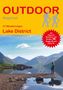 Text oben: "OUTDOOR Regional", "27 Wanderungen Lake District". Unten: Person am See mit Bergen im Hintergrund., Buch