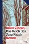 "Iulian Ciocan, Das Reich des Sașa Kozak, Roman" in roten und schwarzen Lettern. Illustration mit kahlen Bäumen und Gebäude., Buch