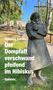 „Wolfgang Bittner: Der Dompfaff verschwand pfeifend im Hibiskus. Gedichte.“ Statue eines Menschen in einem Park., Buch