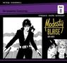„Die kompletten Comicstrips, Band 8. Modesty Blaise 1971-1972.“ Illustration mit Frau in schwarzer Kleidung., Buch