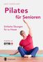 "Pilates für Senioren: Einfache Übungen für zu Hause." Eine Frau in Sportkleidung macht eine seitliche Dehnübung., Buch