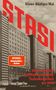 „Klaus-Rüdiger Mai, STASI. Die Geschichte des Ministeriums für Staatssicherheit der DDR.“ Hochhausfassade, roter Text., Buch