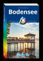 "Bodensee" von Hans-Peter Siebenhaar. Michael Müller Verlag. Menschen auf einem Steg am Wasser bei Sonnenuntergang., Buch