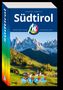 "Südtirol" von Florian und Sibylle Fritz. Michael Müller Verlag, authentisch reisen. Landschaft mit Dorf und Bergen im Hintergrund., Buch