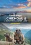 Unterwegs im Chiemgau & im Berchtesgadener Land. Das Reisebuch. Zwei Murmeltiere in einer Berglandschaft., Buch