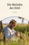 "Die Melodie der Eifel", Paul Bies, Eifeler Erzählungen, Eifelbildverlag. Ein Mann mit Strohhut schreibt in der Natur., Buch